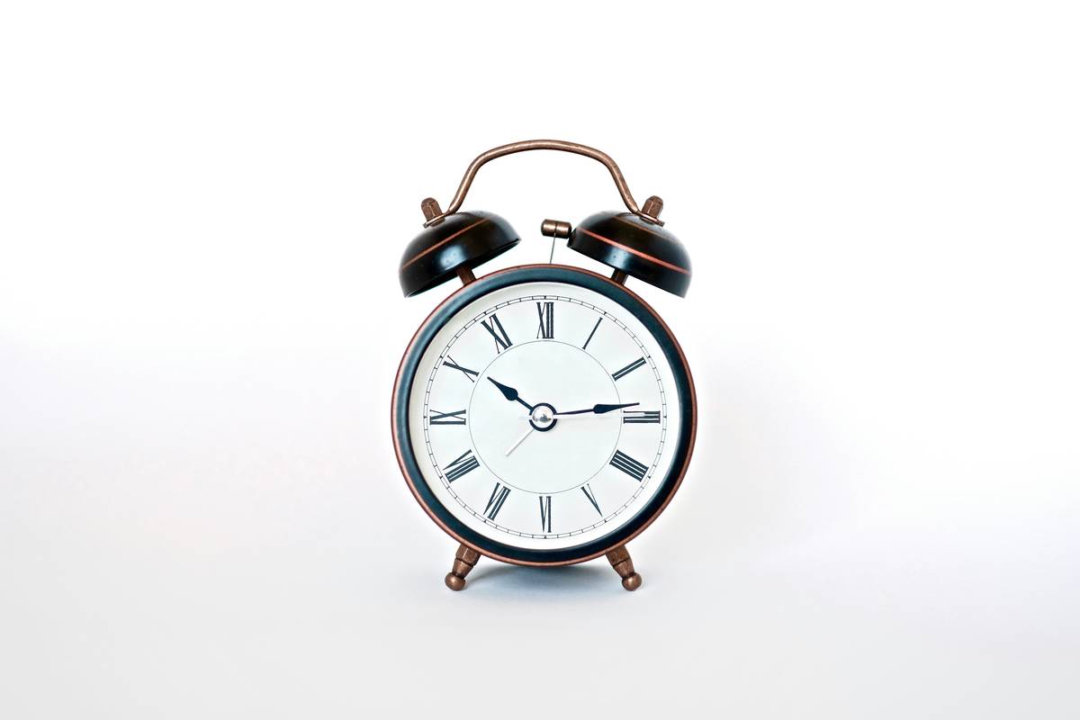 Vintage-inspired mantel and table clocks enhancing farmhouse-style home decor