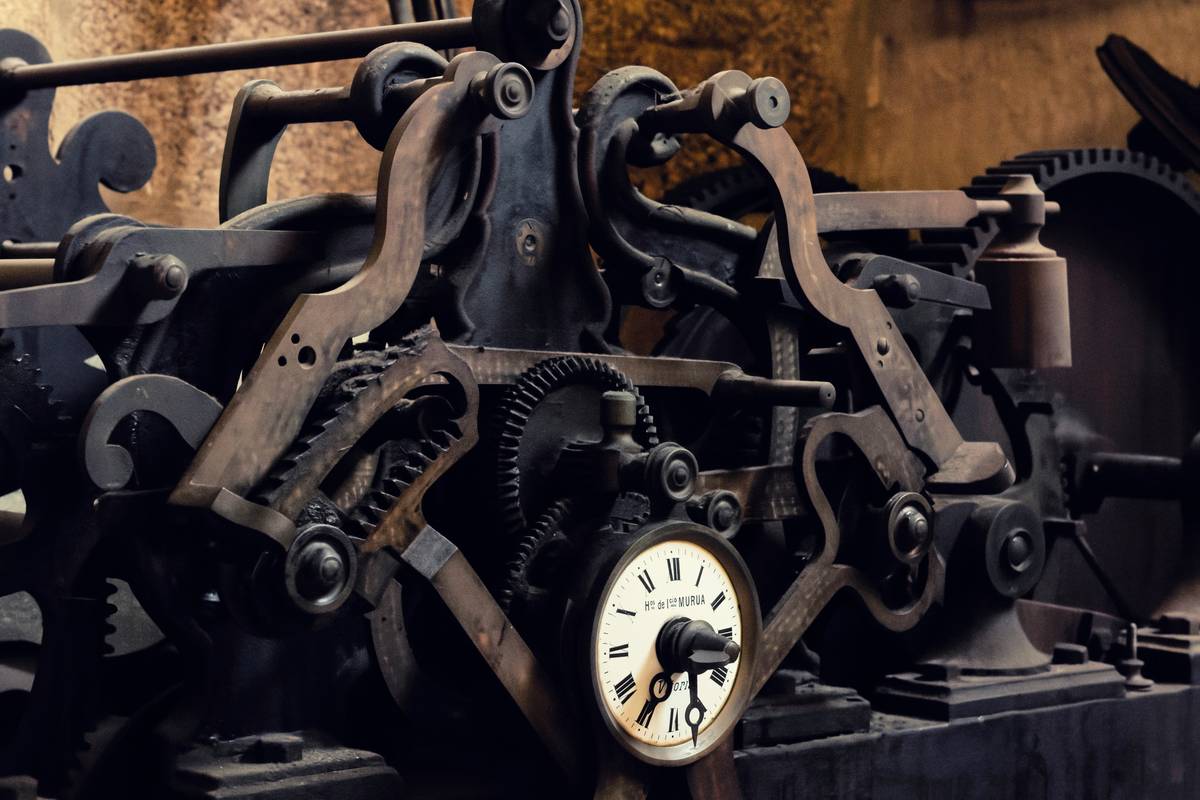 Close-up of authentic mantel clock replacement parts with labeled movement identification numbers